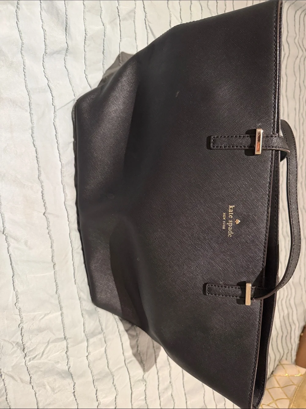 kate spade black leather tote with gold logo